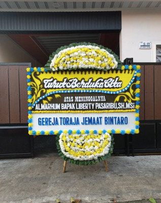 Papan Bunga Duka di Srimartani